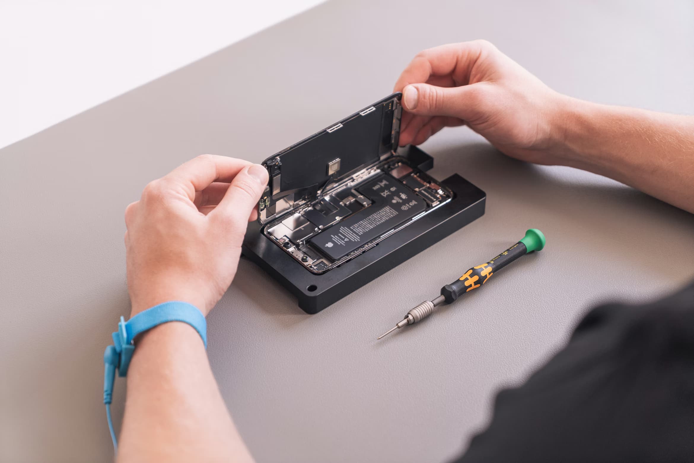 Technician repairing device at CallCabin Preston